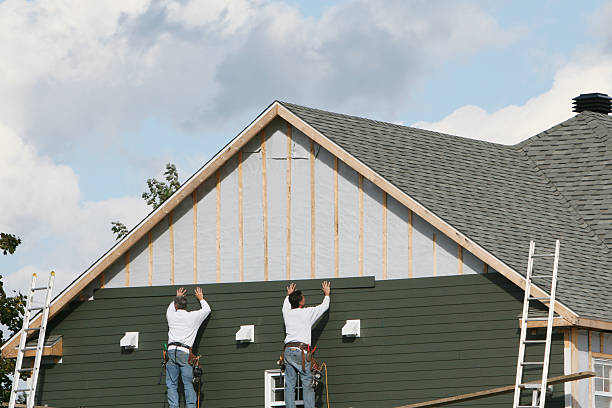 Professional Emergency Siding Repair technician working in Amherst, OH